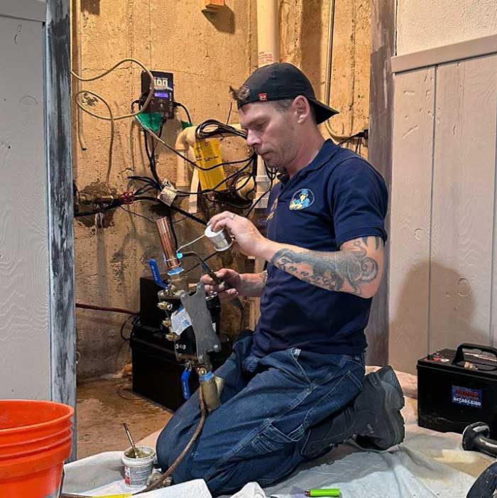 Maximum Plumbing technician installing RPZ near Hawthorn Woods, IL